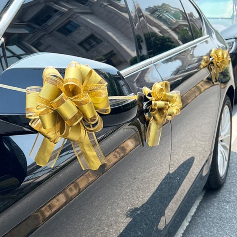 decoration voiture mariage noeuds or