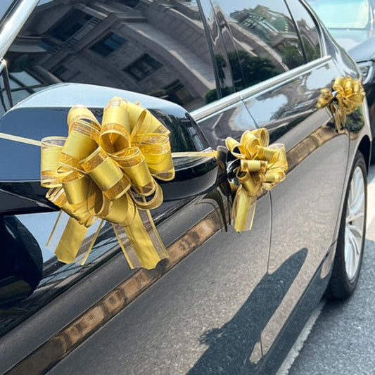 decoration voiture mariage noeuds or